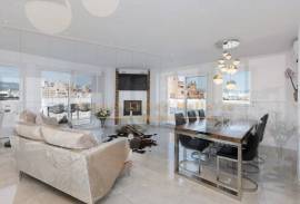 Modern penthouse with wonderful roof terrace and sea view