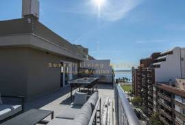 Modern penthouse with wonderful roof terrace and sea view