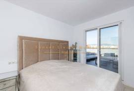 Modern penthouse with wonderful roof terrace and sea view