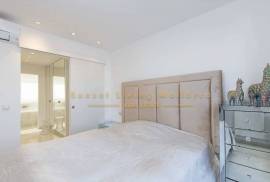 Modern penthouse with wonderful roof terrace and sea view