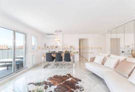 Modern penthouse with wonderful roof terrace and sea view