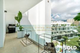 Stylish penthouse in exclusive residential complex with partial sea view in Palmanova