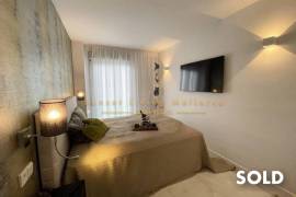Stylish penthouse in exclusive residential complex with partial sea view in Palmanova