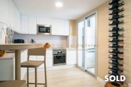 Stylish penthouse in exclusive residential complex with partial sea view in Palmanova