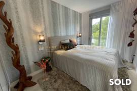 Stylish penthouse in exclusive residential complex with partial sea view in Palmanova
