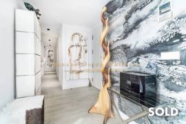 Stylish penthouse in exclusive residential complex with partial sea view in Palmanova