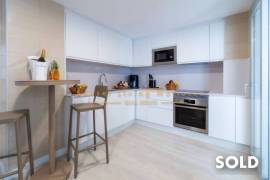 Stylish penthouse in exclusive residential complex with partial sea view in Palmanova