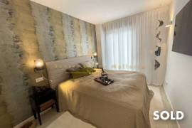 Stylish penthouse in exclusive residential complex with partial sea view in Palmanova