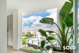 Stylish penthouse in exclusive residential complex with partial sea view in Palmanova