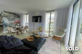 Stylish penthouse in exclusive residential complex with partial sea view in Palmanova